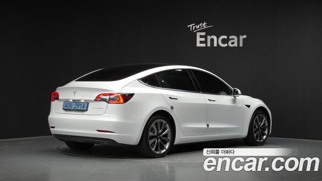 Tesla Model 3 Standard Range Plue RWD - фото 1