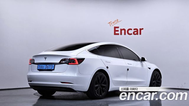 Tesla Model 3 Standard Range Plue RWD - фото 1