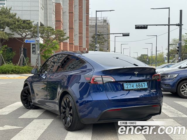 Tesla Model Y Performance AWD - фото 1