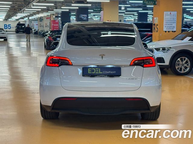 Tesla Model Y Long Range AWD - фото 3