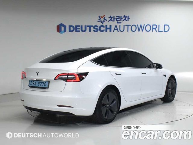 Tesla Model 3 Standard Range Plue RWD - фото 1
