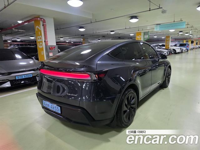Tesla Model Y Long Range AWD - фото 1
