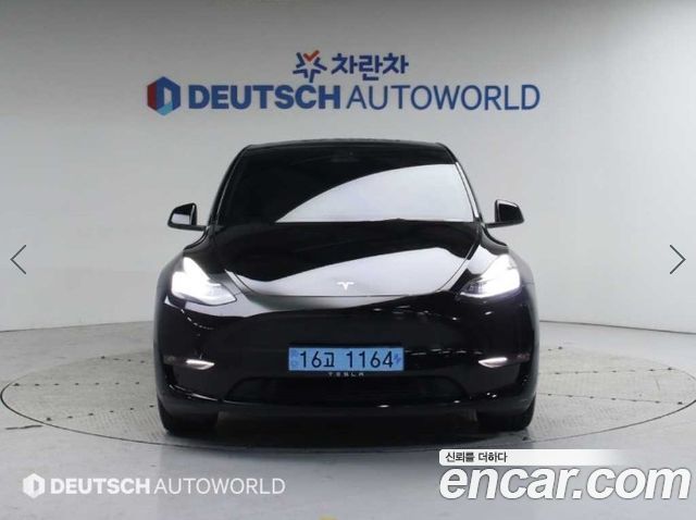 Tesla Model Y Long Range AWD - фото 2