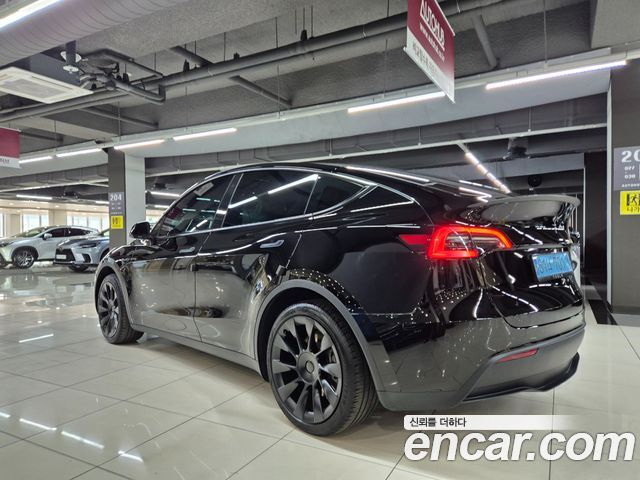 Tesla Model Y RWD - фото 4
